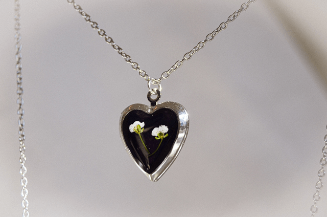 Locket w/ White flowers