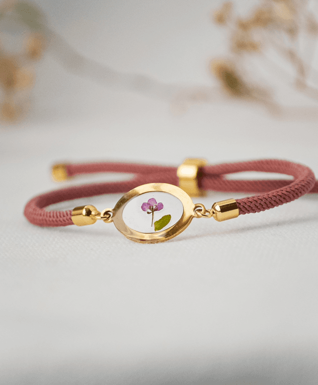 Pulseira bordô escuro